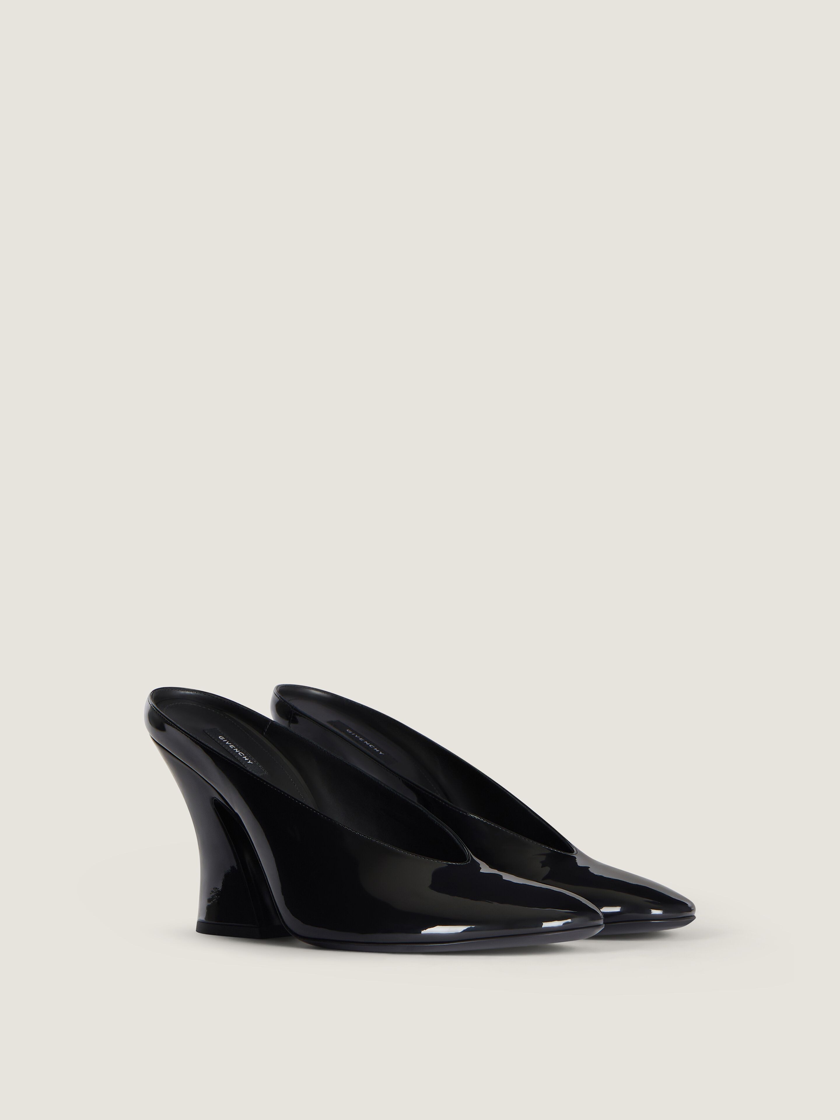 Sculpted heeled mules in patent leather